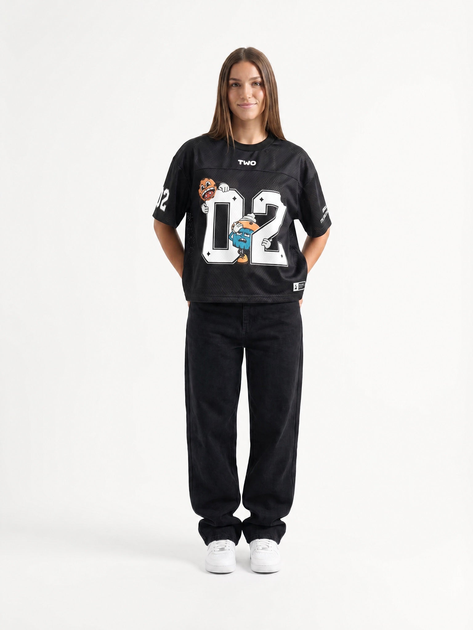 Two Crumbs mesh jersey tee in black — front view, oversized fit, sublimation print 02 graphic with Cookie and Cupcake mascots