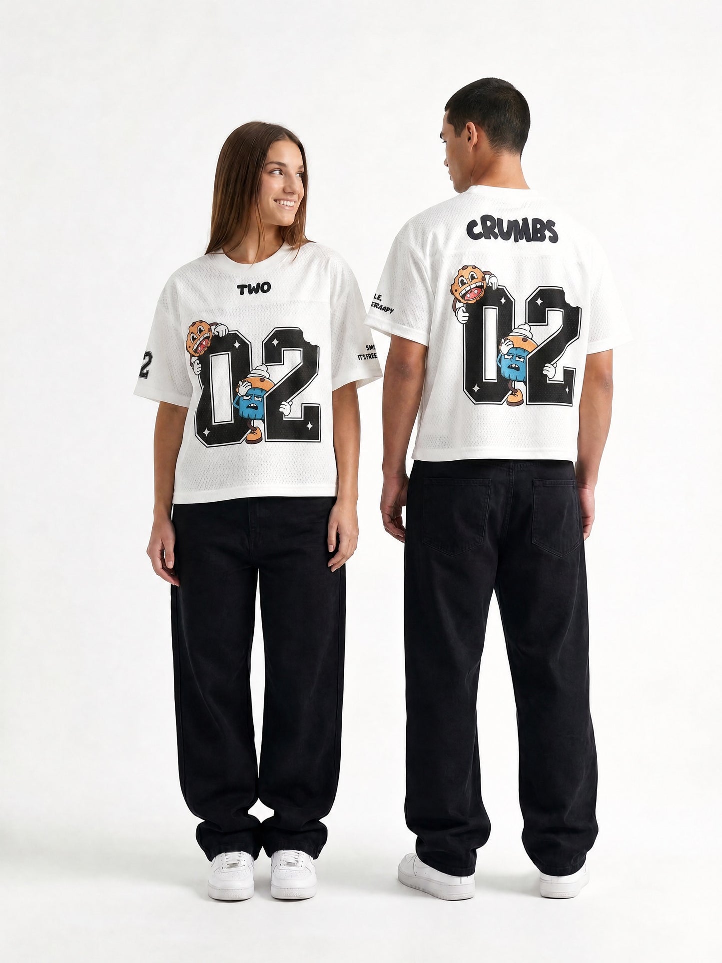 Two Crumbs mesh jersey tee in white — couple wearing oversized 02 mesh jersey, back-to-back hero shot