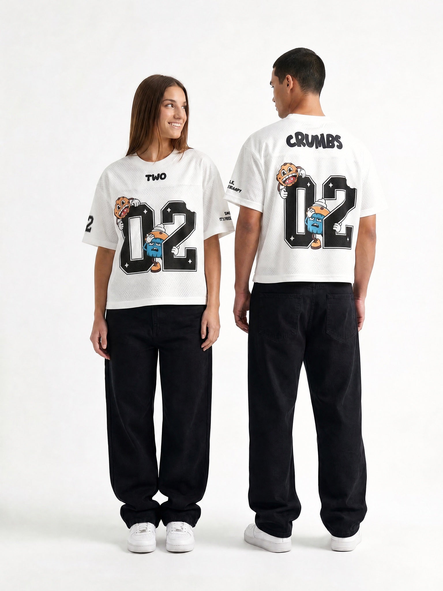 Two Crumbs mesh jersey tee in white — couple wearing oversized 02 mesh jersey, back-to-back hero shot