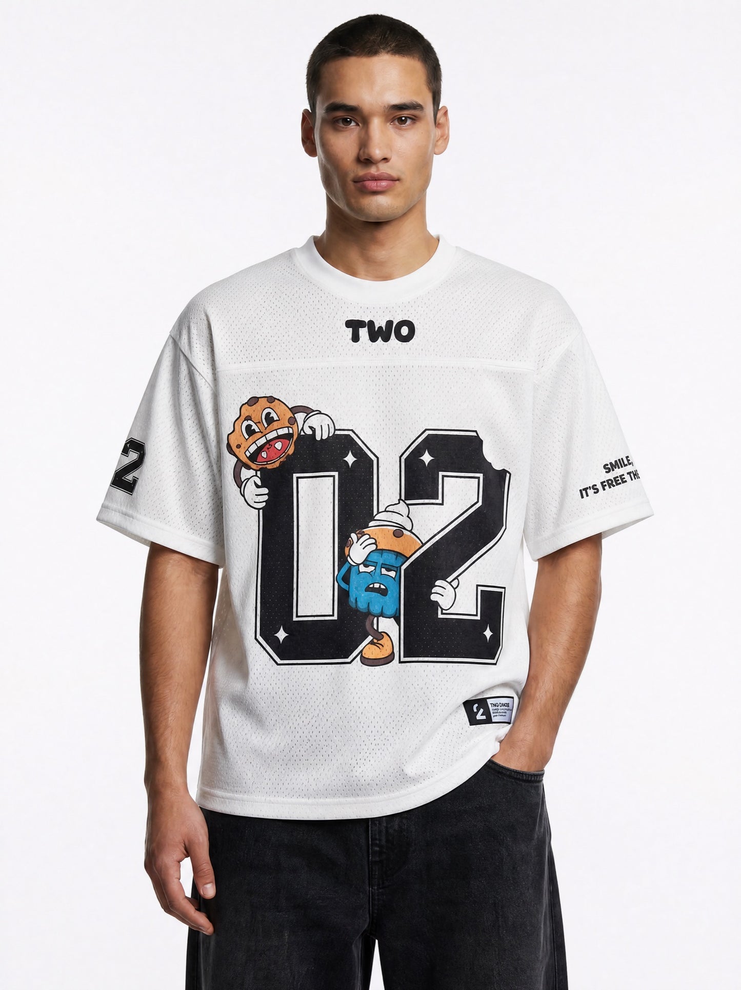 Two Crumbs mesh jersey tee in white — front view, drop-shoulder oversized fit with 02 number and mascot graphic